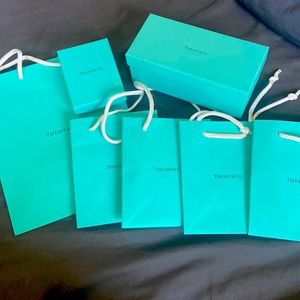 4 small 1 medium 1 sun glass box and 1 small jewelry box